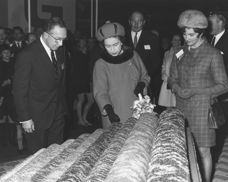 Neville Cormack giving Queen Elizabeth II a tour of Brookhouse Mill